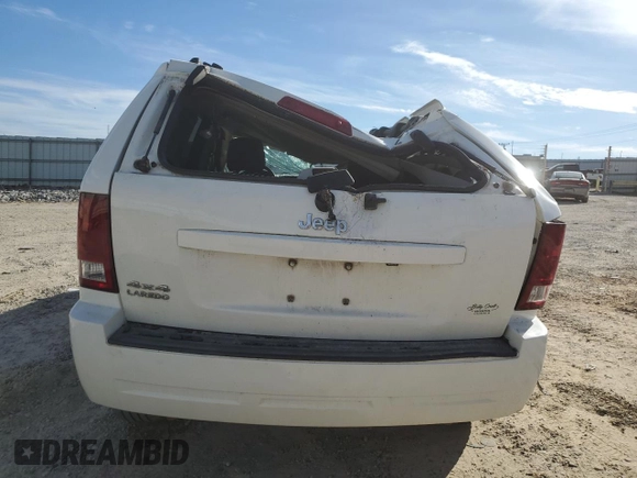 2010 Jeep Grand Cherokee Laredo with VIN 1J4PR4GK1AC100542, listed as a Copart auction lot 46047325 with 146,499 mi miles and Salvage Title. Bid and sale history available at carsss.com. Image 6.