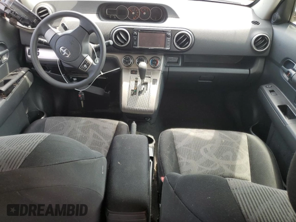 2015 Scion xB z VIN JTLZE4FE4FJ070322, wystawiony jako Copart lot #55056195 z przebiegiem 122 071 mil mil oraz Szkoda całkowita • Salvage title. Historia ofert i sprzedaży dostępna na DreamBid. Obrazek 8.
