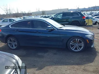 2016 BMW 4 Series 428i xDrive with VIN WBA4C9C56GG141089, listed as a IAAI auction lot 41587479 with 85,462 mi miles and . Bid and sale history available at DreamBid. Image 13.
