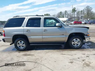 2002 Chevrolet Tahoe Z71 with VIN 1GNEK13Z32R237152, listed as a IAAI auction lot 41855170 with 141,637 mi miles. Bid and sale history available at carsss.com. Image 13.