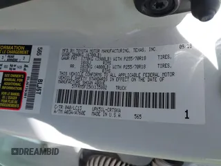 2019 Toyota Tundra SR with VIN 5TFRM5F15KX135882, listed as a IAAI auction lot 41681903 with 253,675 mi miles and . Bid and sale history available at DreamBid. Image 9.