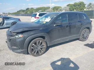 2023 Mazda CX-50 S Premium Plus with VIN 7MMVABEM1PN141344, listed as a IAAI auction lot 41473823 with 12,120 mi miles and . Bid and sale history available at DreamBid. Image 2.