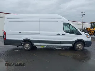 2023 Ford Transit Cargo with VIN 1FTBR3U89PKA09391, listed as a IAAI auction lot 41993662 with 36,147 mi miles and . Bid and sale history available at DreamBid. Image 13.