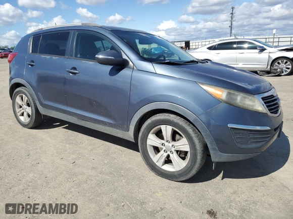 2012 Kia Sportage LX with VIN KNDPB3A25C7228825, listed as a Copart auction lot 51379475 with 184,372 mi miles and Salvage Title. Bid and sale history available at carsss.com. Image 4.