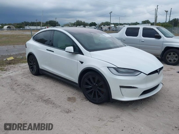 2022 Tesla Model X with VIN 7SAXCBE56NF364067, listed as a IAAI auction lot 40947378 with Not Provided miles and . Bid and sale history available at DreamBid. Image 1.