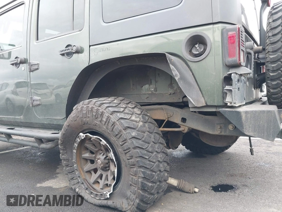 2008 Jeep Wrangler Unlimited Rubicon with VIN 1J8GA69168L591089, listed as a IAAI auction lot 41487746 with 161,916 mi miles and . Bid and sale history available at DreamBid. Image 6.