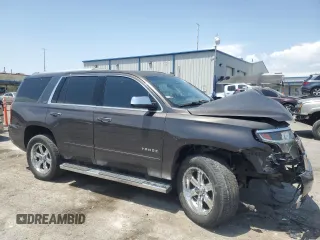 2015 Chevrolet Tahoe LTZ with VIN 1GNSKCKC2FR157035, listed as a Copart auction lot 59990415 with Not provided miles and Salvage title. Bid and sale history available at DreamBid. Image 4.
