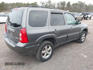 2006 Mazda Tribute S with VIN 4F2YZ04196KM12510, listed as a IAAI auction lot 41382627 with 242,650 mi miles and . Bid and sale history available at DreamBid. Image 12.