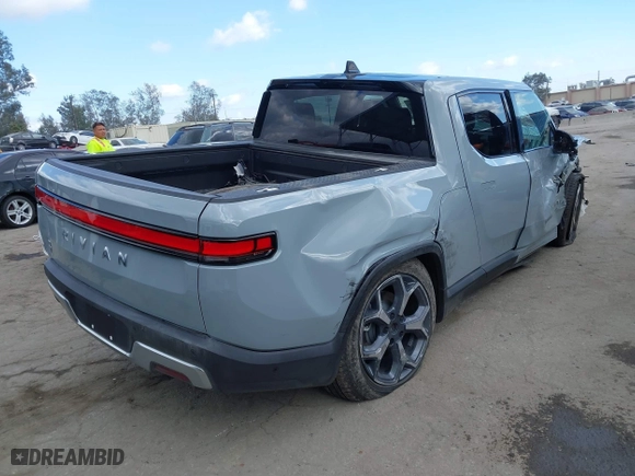 2023 Rivian R1T Adventure with VIN 7FCTGBAA9PN027894, listed as a IAAI auction lot 42061339 with 5,047 mi miles. Bid and sale history available at carsss.com. Image 4.