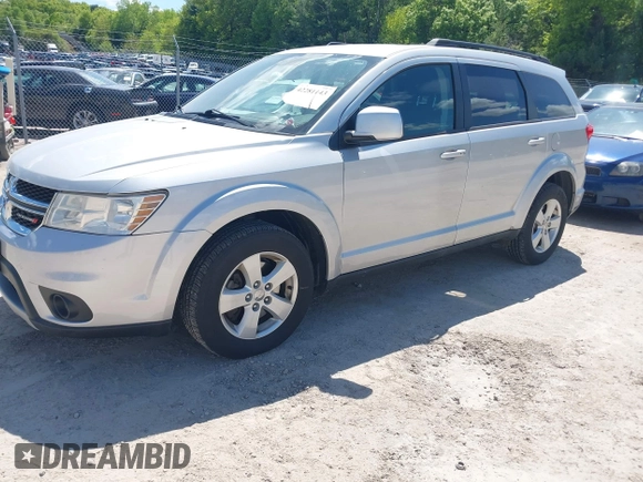 2012 Dodge Journey SXT z VIN 3C4PDCBGXCT390031, wystawiony jako IAAI lot #42281143 z przebiegiem 130 213 mil mil oraz . Historia ofert i sprzedaży dostępna na DreamBid. Obrazek 2.