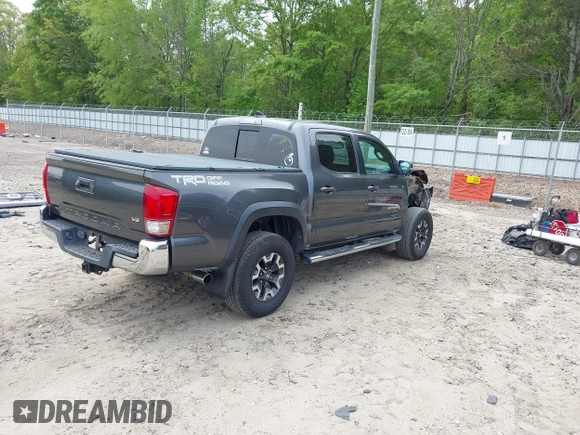 2017 Toyota Tacoma SR5 with VIN 3TMAZ5CN7HM026618, listed as a IAAI auction lot 42033682 with 96,430 mi miles and . Bid and sale history available at carsss.com. Image 4.