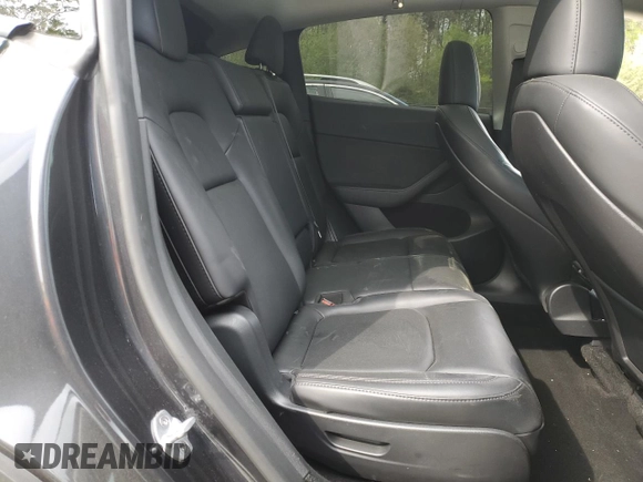 2024 Tesla Model Y Long Range z VIN 7SAYGAEEXRF987104, wystawiony jako Copart lot #54056015 z przebiegiem 24 027 mil mil oraz Szkoda całkowita • Salvage title. Historia ofert i sprzedaży dostępna na DreamBid. Obrazek 10.