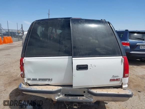 1999 GMC Suburban with VIN 1GDFK16R0XJ728255, listed as a IAAI auction lot 42230595 with Not provided miles and . Bid and sale history available at DreamBid. Image 16.