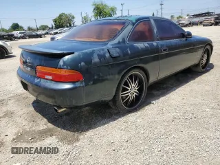 1994 Lexus SC 400 z VIN JT8UZ30C7R0037254, wystawiony jako Copart lot #57633215 z przebiegiem 196 214 mil mil oraz Szkody całkowita. Historia ofert i sprzedaży dostępna na DreamBid. Obrazek 3.