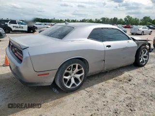 2016 Dodge Challenger SXT z VIN 2C3CDZAG1GH137976, wystawiony jako Copart lot #58702105 z przebiegiem 244 470 mil mil oraz Szkoda całkowita • Salvage title. Historia ofert i sprzedaży dostępna na DreamBid. Obrazek 3.