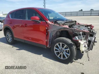 2023 Mazda CX-5 2.5 S Preferred Package with VIN JM3KFBCMXP0184897, listed as a Copart auction lot 50264135 with 28,556 mi miles and Salvage Title. Bid and sale history available at carsss.com. Image 4.