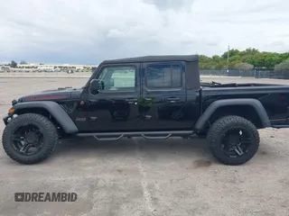 2021 Jeep Gladiator Rubicon с VIN 1C6JJTBG6ML622904, выставлен на аукционе IAAI как лот 42167412 с пробегом 21 889 миль миль и . История ставок и продаж доступна на DreamBid. Изображение 14.