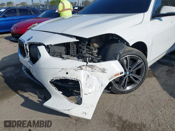 2021 BMW 2 Series 228i with VIN WBA53AK09M7H30650, listed as a IAAI auction lot 42043390 with 89,611 mi miles and . Bid and sale history available at DreamBid. Image 6.