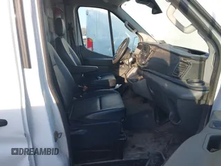 2022 Ford Transit Cargo z VIN 1FTBR3X8XNKA71066, wystawiony jako IAAI lot #41771120 z przebiegiem 87 702 mil mil oraz . Historia ofert i sprzedaży dostępna na DreamBid. Obrazek 5.
