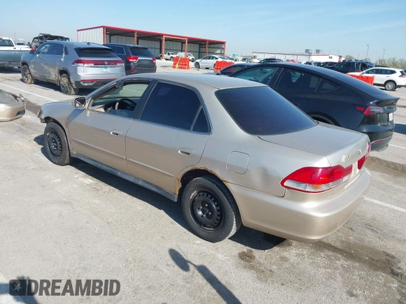 2002 Honda Accord LX with VIN 3HGCG56412G702456, listed as a IAAI auction lot 42040650 with 203,310 mi miles and . Bid and sale history available at DreamBid. Image 3.