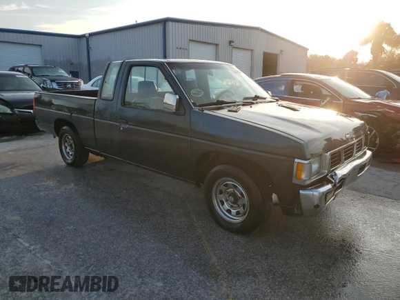 1994 Nissan Frontier XE z VIN 1N6SD16S1RC372743, wystawiony jako Copart lot #54486495 z przebiegiem 206 951 mil mil oraz Szkoda całkowita • Salvage title. Historia ofert i sprzedaży dostępna na DreamBid. Obrazek 4.