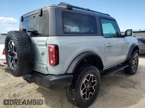2021 Ford Bronco z VIN 1FMDE5CP4MLA65927, wystawiony jako Copart lot #74809974 z przebiegiem 41 296 mil mil oraz Nie do naprawy • Non repairable. Historia ofert i sprzedaży dostępna na DreamBid. Obrazek 3.