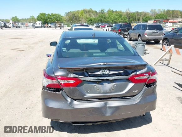 2019 Toyota Camry LE with VIN 4T1B11HK8KU289721, listed as a IAAI auction lot 42021107 with 69,828 mi miles and . Bid and sale history available at DreamBid. Image 6.
