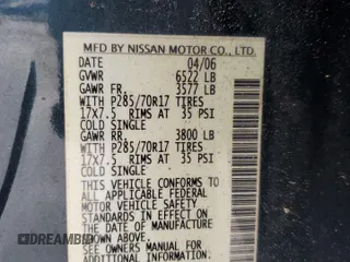 2006 Nissan Titan LE z VIN 1N6BA07B16N557411, wystawiony jako Copart lot #86058634 z przebiegiem 263 198 mil mil oraz Szkody całkowita. Historia ofert i sprzedaży dostępna na DreamBid. Obrazek 12.