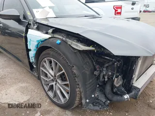 2023 Audi A6 Premium Plus z VIN WAUL2BF27PN039318, wystawiony jako IAAI lot #41603715 z przebiegiem 32 892 mil mil oraz . Historia ofert i sprzedaży dostępna na DreamBid. Obrazek 19.