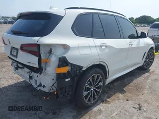 2021 BMW X5 xDrive45e with VIN 5UXTA6C08M9F38909, listed as a IAAI auction lot 42172536 with 71,741 mi miles and . Bid and sale history available at DreamBid. Image 4.
