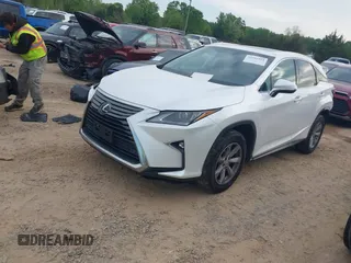 2016 Lexus RX 350 F Sport with VIN 2T2BZMCA3GC010155, listed as a IAAI auction lot 41991594 with 168,478 mi miles. Bid and sale history available at carsss.com. Image 2.