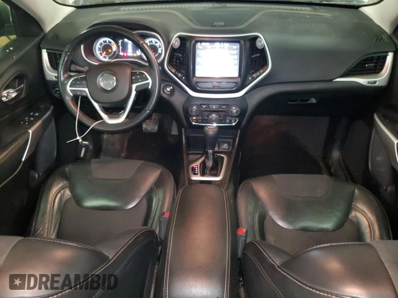 2018 Jeep Cherokee Latitude Plus z VIN 1C4PJLLB7JD590136, wystawiony jako Copart lot #64295715 z przebiegiem 143 699 mil mil oraz Szkoda całkowita • Salvage title. Historia ofert i sprzedaży dostępna na DreamBid. Obrazek 8.