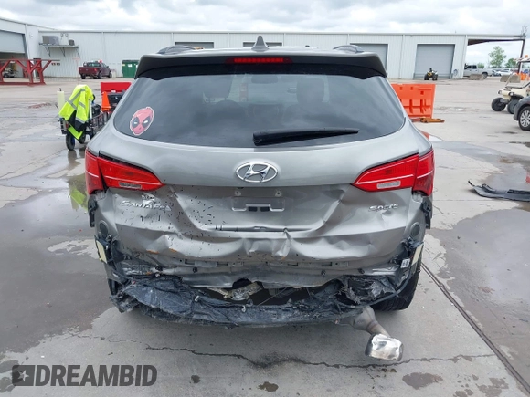 2014 Hyundai Santa Fe with VIN 5XYZU3LB2EG155127, listed as a IAAI auction lot 41864518 with Not provided miles and . Bid and sale history available at DreamBid. Image 17.