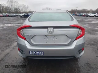 2016 Honda Civic EX with VIN 19XFC2F75GE217935, listed as a IAAI auction lot 41963307 with 87,477 mi miles and . Bid and sale history available at DreamBid. Image 16.