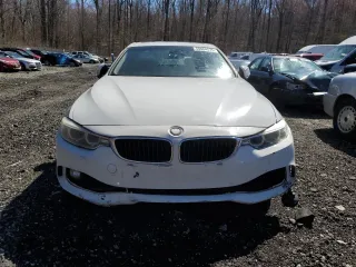 2015 BMW 4 Series 428i z VIN WBA4A9C53FGL85500, wystawiony jako Copart lot #50004575 z przebiegiem 129 018 mil mil oraz Szkoda całkowita • Salvage title. Historia ofert i sprzedaży dostępna na DreamBid. Obrazek 5.