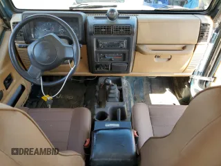 1997 Jeep Wrangler SE with VIN 1J4FY29P3VP492935, listed as a Copart auction lot 67607644 with 129,227 mi miles and Salvage Title. Bid and sale history available at carsss.com. Image 8.