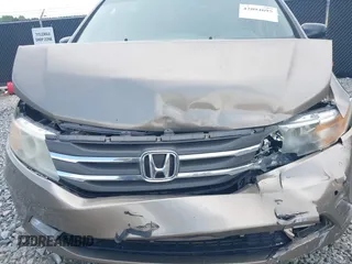 2011 Honda Odyssey Touring с VIN 5FNRL5H98BB095796, выставлен на аукционе IAAI как лот 42094695 с пробегом 158 410 миль миль и . История ставок и продаж доступна на DreamBid. Изображение 6.
