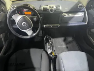 2012 Smart fortwo Pure z VIN WMEEJ3BA5CK540092, wystawiony jako Copart lot #51878135 z przebiegiem 59 356 mil mil oraz Szkody całkowita. Historia ofert i sprzedaży dostępna na DreamBid. Obrazek 9.