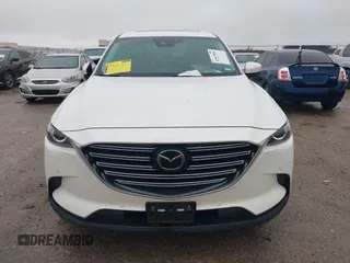 2019 Mazda CX-9 Touring with VIN JM3TCACY2K0328347, listed as a IAAI auction lot 41917854 with 67,173 mi miles and . Bid and sale history available at DreamBid. Image 12.