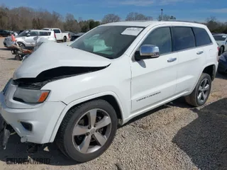 2014 Jeep Grand Cherokee Overland with VIN 1C4RJFCT6EC126897, listed as a IAAI auction lot 41826773 with 115,251 mi miles. Bid and sale history available at carsss.com. Image 2.