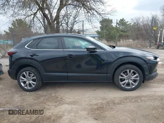 2021 Mazda CX-30 Preferred z VIN 3MVDMBCL5MM205824, wystawiony jako IAAI lot #41991942 z przebiegiem 58 112 mil mil oraz . Historia ofert i sprzedaży dostępna na DreamBid. Obrazek 13.