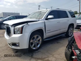 2016 GMC Yukon Denali with VIN 1GKS2CKJ3GR391360, listed as a Copart auction lot 65940114 with 51,040 mi miles and Salvage Title. Bid and sale history available at carsss.com. Image 1.