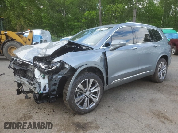2025 Cadillac XT6 AWD Premium Luxury z VIN 1GYKPDRS8SZ118323, wystawiony jako Copart lot #56156145 z przebiegiem 12 406 mil mil oraz Tytuł czysty. Historia ofert i sprzedaży dostępna na DreamBid. Obrazek 1.