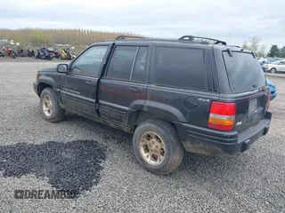 1998 Jeep Grand Cherokee Limited with VIN 1J4GZ78YXWC141912, listed as a IAAI auction lot 41972948 with 291,801 mi miles. Bid and sale history available at carsss.com. Image 3.