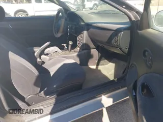 2002 Saturn SC with VIN 1G8ZY14732Z144888, listed as a IAAI auction lot 41617831 with 138,564 mi miles. Bid and sale history available at carsss.com. Image 5.