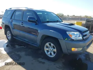 2003 Toyota 4Runner SR5 with VIN JTEZT14R238001097, listed as a IAAI auction lot 41266011 with 180,905 mi miles. Bid and sale history available at carsss.com. Image 1.