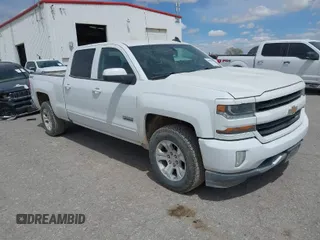 2018 Chevrolet Silverado 1500 LT with VIN 1GCUKREC5JF133998, listed as a IAAI auction lot 41880805 with 166,258 mi miles and . Bid and sale history available at DreamBid. Image 1.