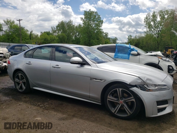 2017 Jaguar XF with VIN SAJBL4BN6HCY44054, listed as a Copart auction lot 55842675 with 124,273 mi miles and Salvage Title. Bid and sale history available at DreamBid. Image 4.
