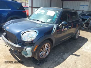 2014 MINI Countryman S with VIN WMWZC3C5XEWP27221, listed as a IAAI auction lot 41957817 with 112,353 mi miles and . Bid and sale history available at DreamBid. Image 18.