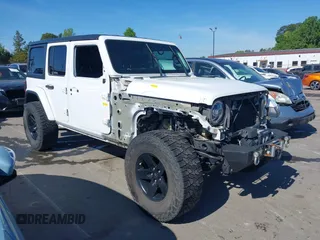 2018 Jeep Wrangler Unlimited Sahara z VIN 1C4HJXEG4JW106111, wystawiony jako IAAI lot #41994833 z przebiegiem 99 583 mil mil oraz . Historia ofert i sprzedaży dostępna na DreamBid. Obrazek 14.